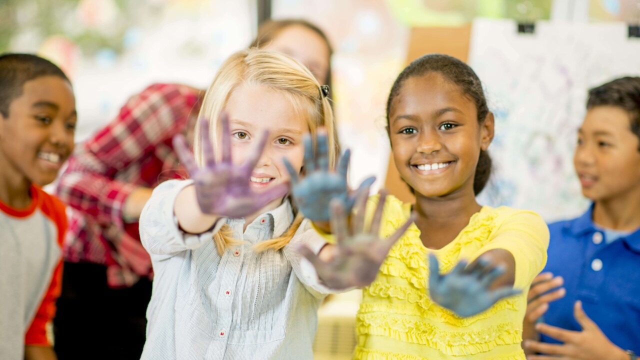 Kids with hands painted.